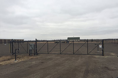 Fence perimeter and keycode access gate at the Randolph Storage facility